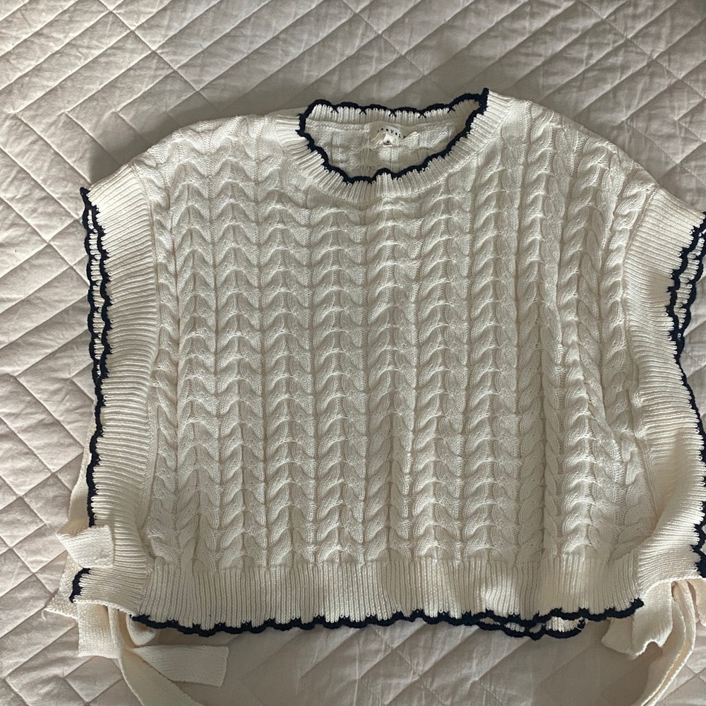 Elegant White Sweater with Black Trim